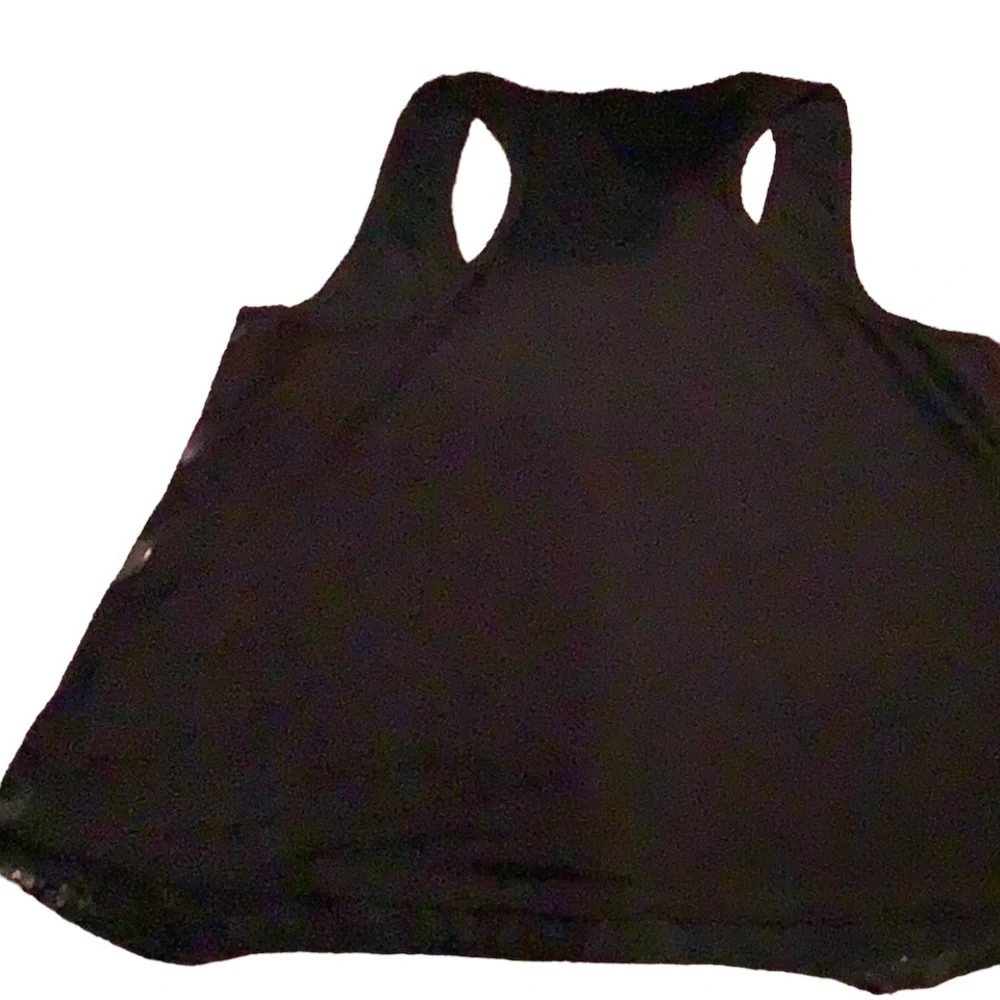 Delia’s small animal print Racer back top, black with sparkles on front